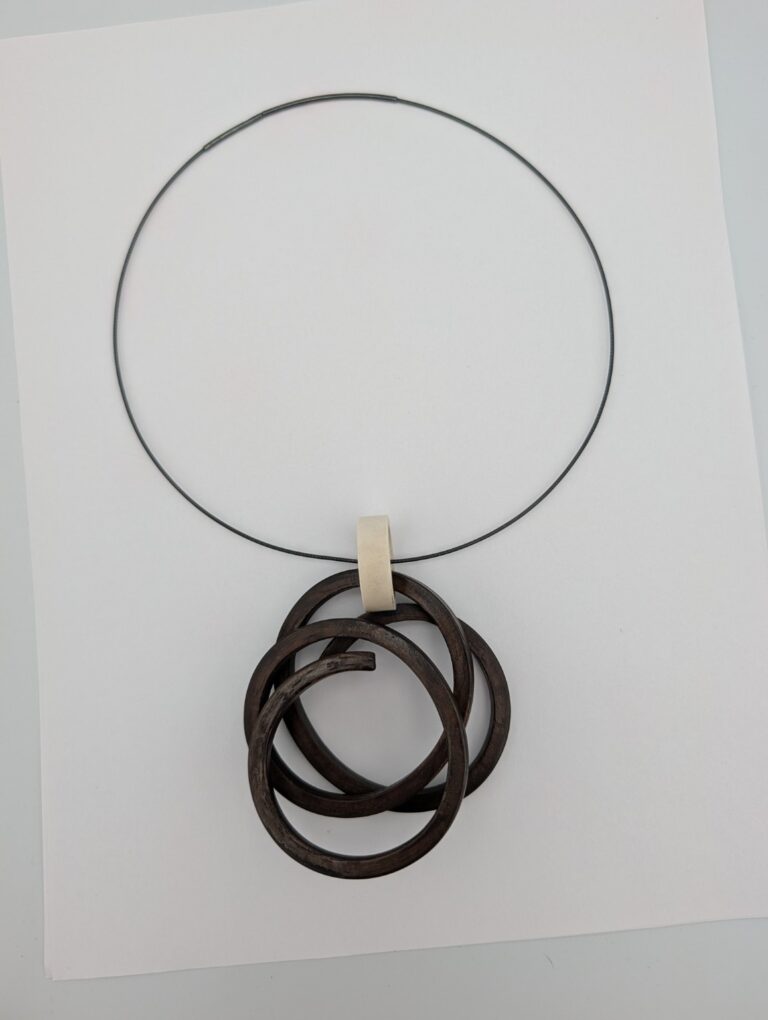Held Knot Neckpiece by Gustav Reyes.