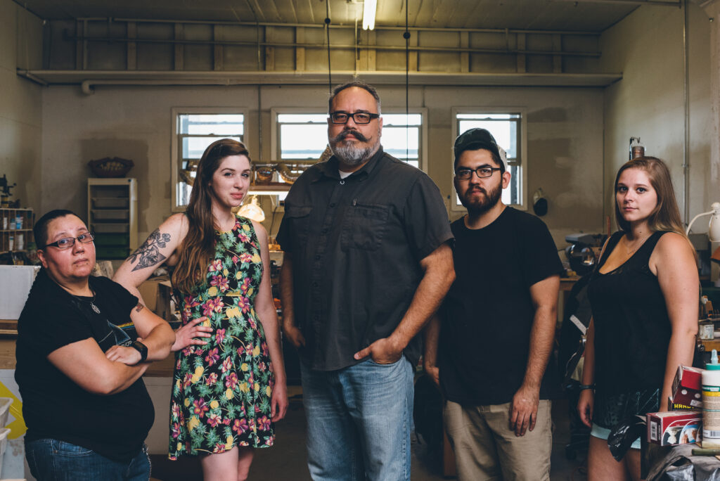 Simply Wood Rings studio team in the Chicago workshop during the production period.