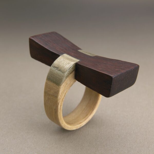 The Key, a 2008 sculptural wooden ring by Gustav Reyes.