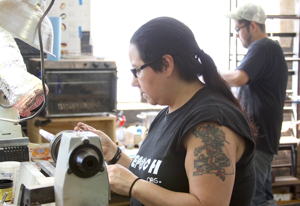 Yolanda and Cesar working in the Simply Wood Rings studio in Chicago.